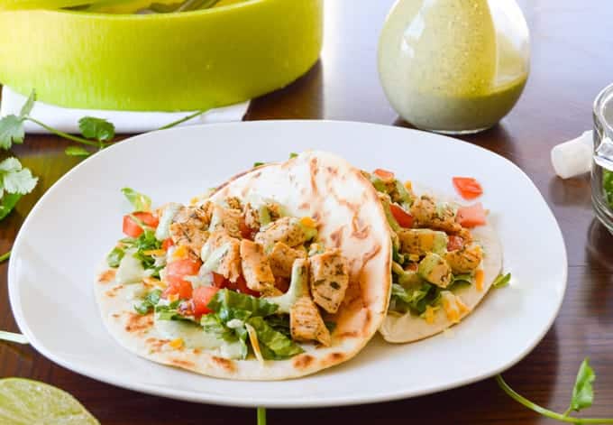 Ranch Chicken Tacos plated with cilantro ranch dressing