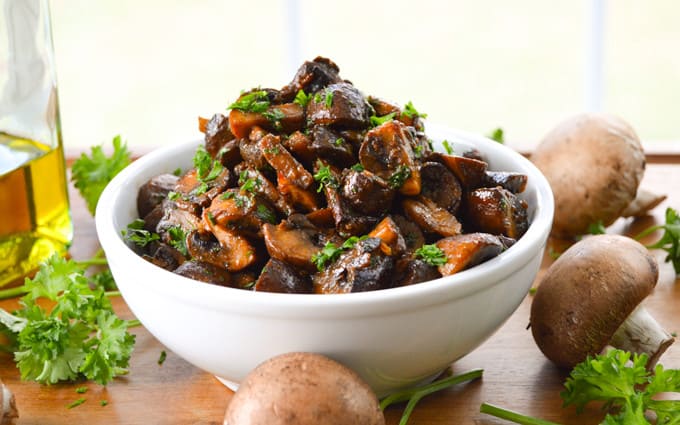 Smoky Garlic Roasted Mushrooms bowl with mushrooms and olive oil