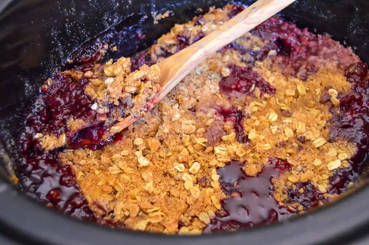 Slow Cooker Triple Berry Crisp in Crock Pot after cooking