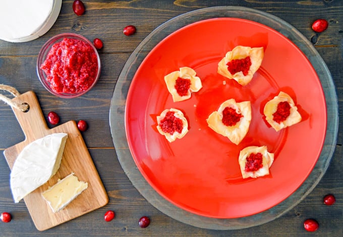 Brie & Cranberry Relish Phyllo Bites over top with relish and cheese