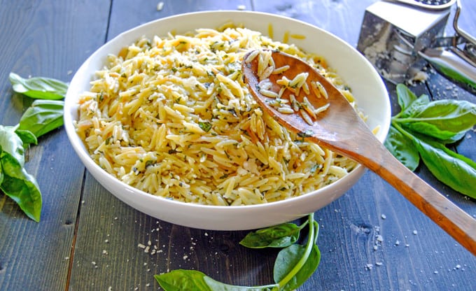 Simple Basil Parmesan Orzo with basil and cheese shredder