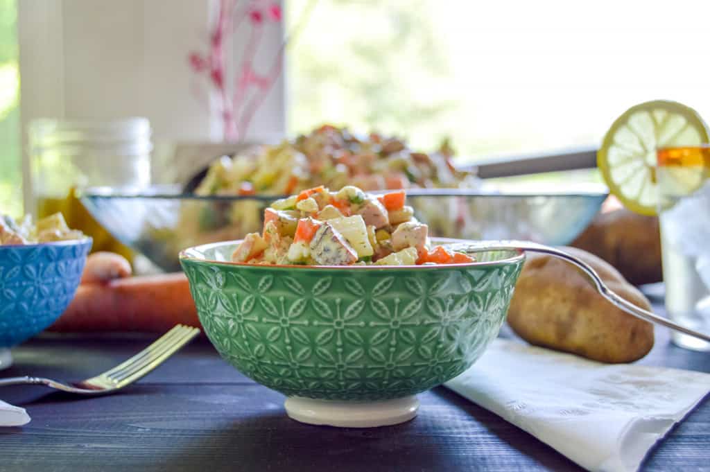  Olivier Russian Potato Salad aka Salat Olivye up close in a small bowl