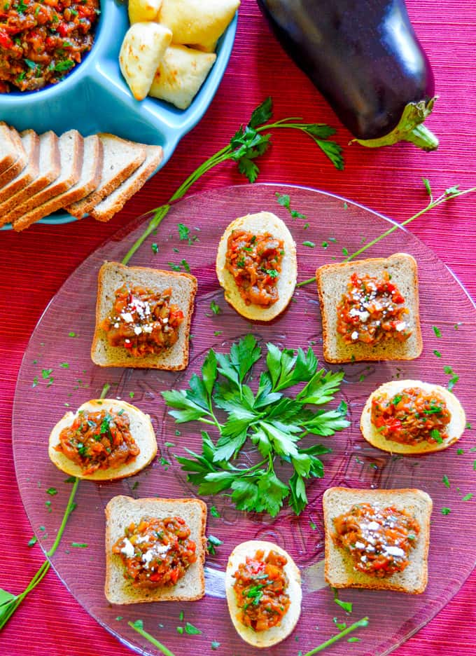 Roasted Red Pepper & Eggplant Spread plated as a spread and dip with eggplant