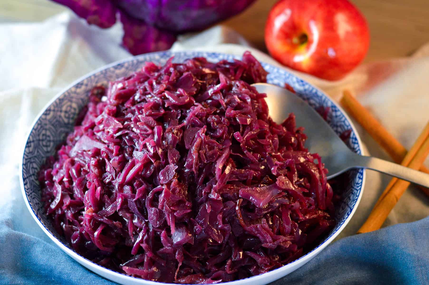 Sweet & Simple Braised Red Cabbage Close up in bowl with apple
