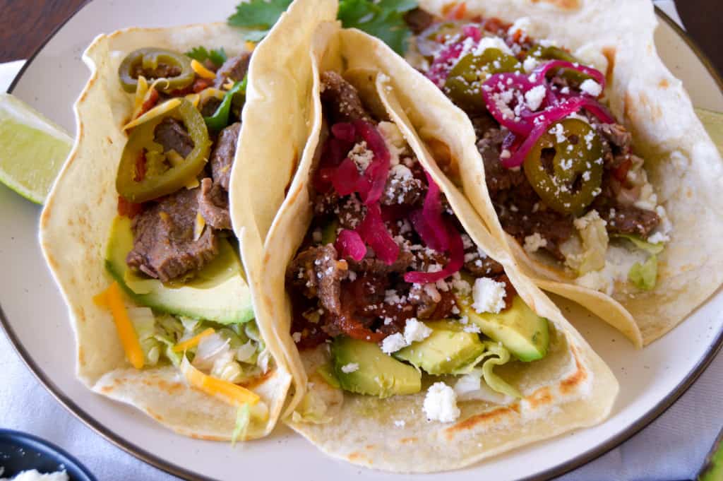 Up Close look at Flank Steak Tacos with toppings