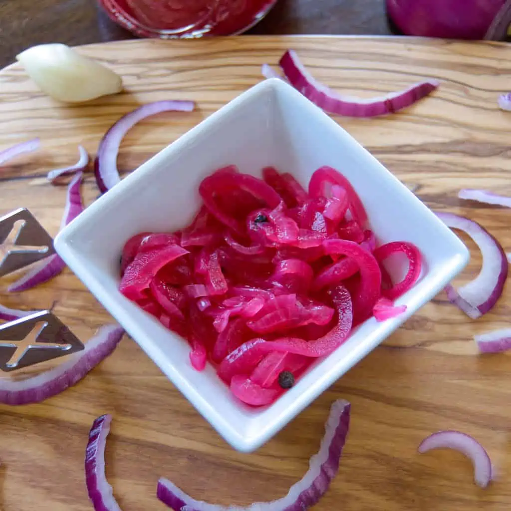 Quick Pickled Red Onions with garlic and peppercorns