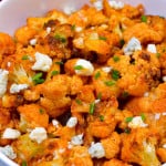Buffalo Cauliflower Up close with blue cheese crumbles and chives