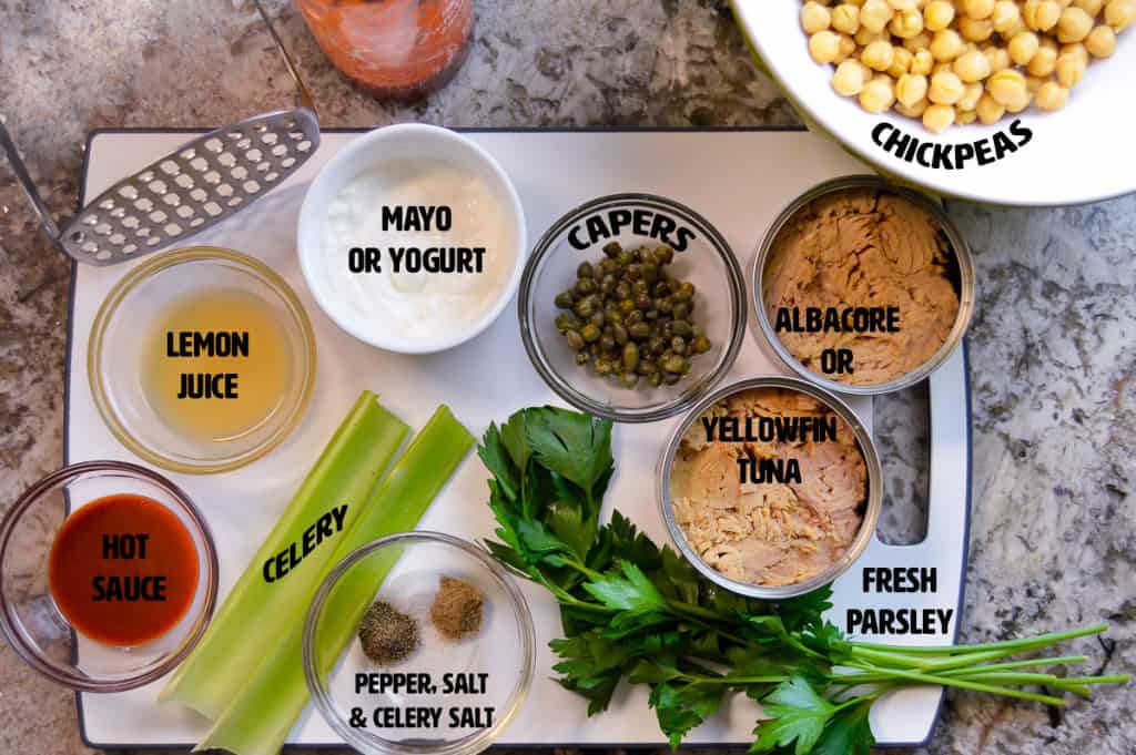 Ingredients shown for Tuna Chickpea salad on cutting board, ramekins and bowl