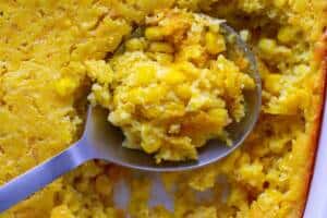 Southern Corn Pudding Casserole Up close in serving spoon