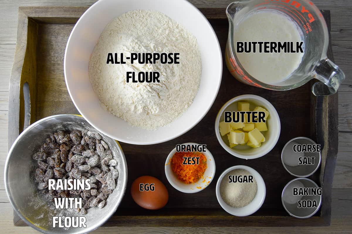 Ingredients shown for Irish Soda Bread: all-purpose flour, sugar, baking soda, kosher salt, butter, buttermilk, orange zest, raisins